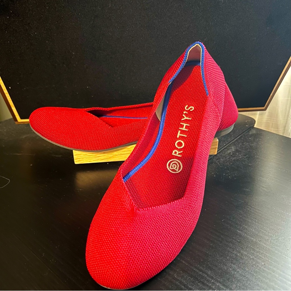 Bright red Rothy’s flats